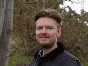Portrait of Justin Adams